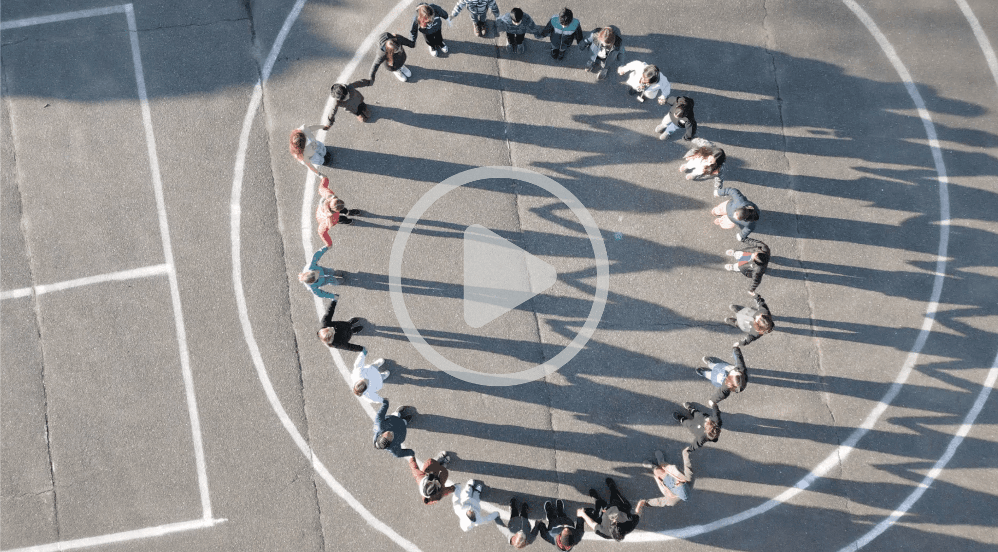 children playing on the blacktop, drone view