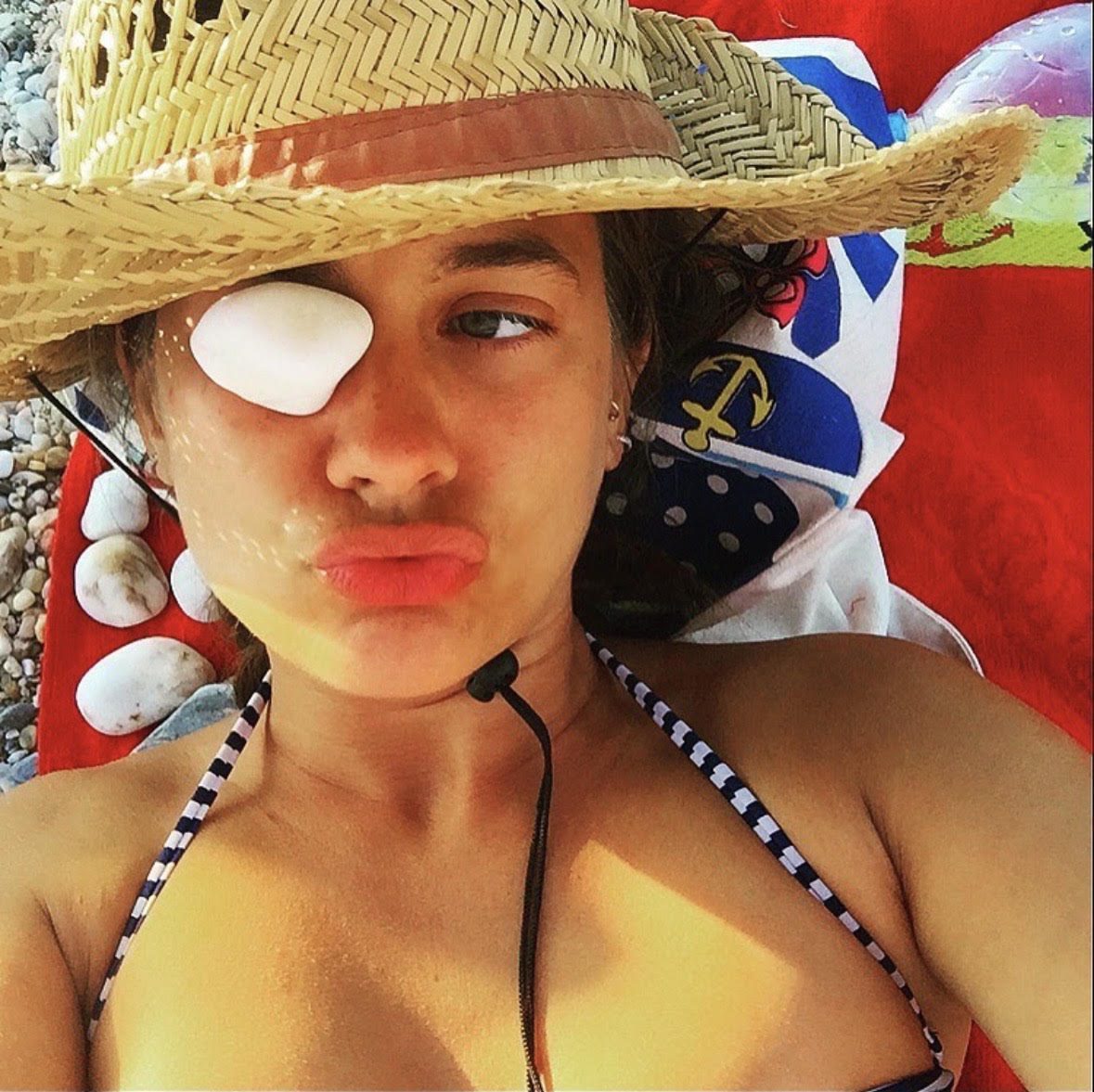 Katie Chonacas in Hat and sea shell